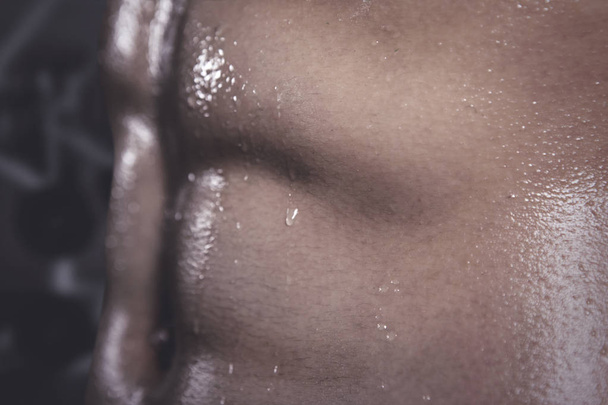 Sweaty belly of an athletic man after exercising - Foto, Bild