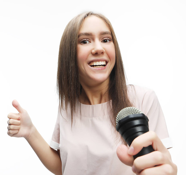 beautiful stylish woman singing karaoke  - Фото, изображение