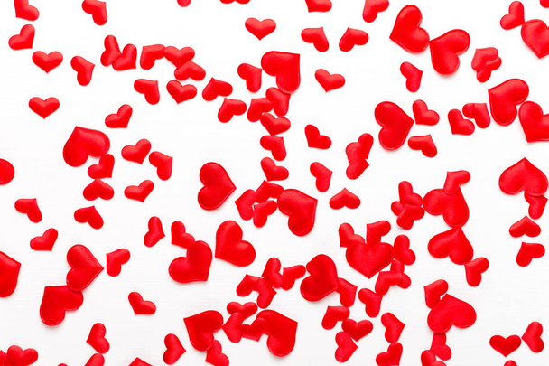 Valentines day background red hearts on white wooden background. - 写真・画像