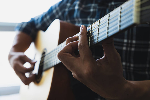 Close up men playing guitar - Фото, изображение