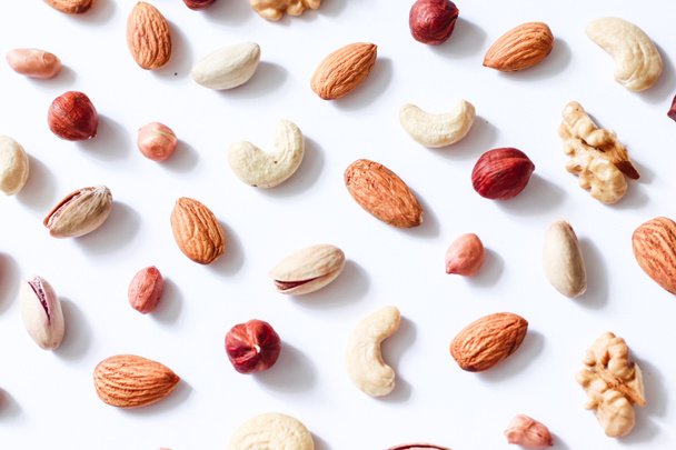 Pattern of nuts mix: cashew, hazelnuts, walnuts, almonds  - Photo, Image