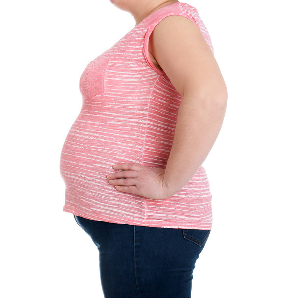Overweight woman on white background, closeup. Weight loss - 写真・画像