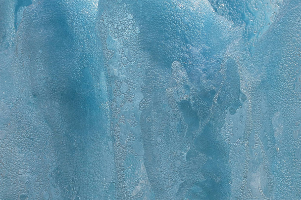 fundo feito com água e gotas de cor azul
 - Foto, Imagem