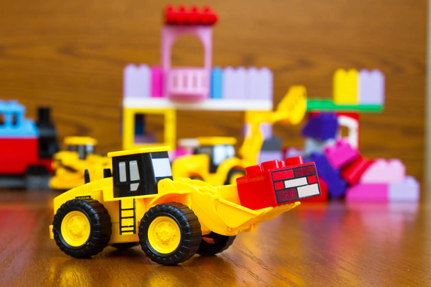Toy bulldozer with bricks - Photo, Image