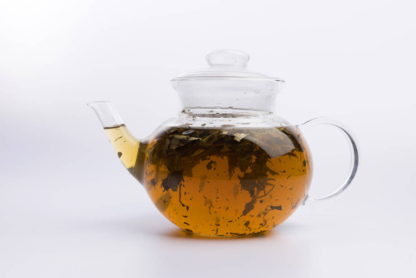 herbal tea with aroma fresh herb isolated on white background - 写真・画像