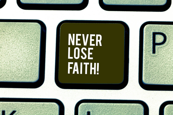 Word writing text Never Lose Faith. Business concept for do not stop believing in someone or something or doubtful Keyboard key Intention to create computer message pressing keypad idea. - Photo, Image