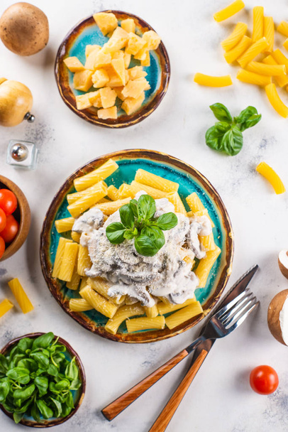 Italian pasta with cheese and mushrooms - 写真・画像