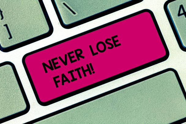 Conceptual hand writing showing Never Lose Faith. Business photo showcasing do not stop believing in someone or something or doubtful Keyboard key Intention to create computer message idea. - Photo, Image