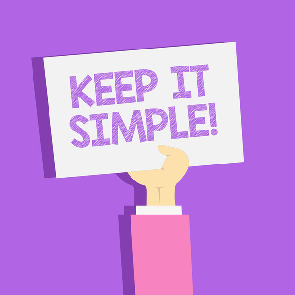 Text sign showing Keep It Simple. Conceptual photo ask something easy understand not go into too much detail Clipart of Hand Holding Up Blank Sheet of White Paper on Pastel Backdrop. - Photo, Image
