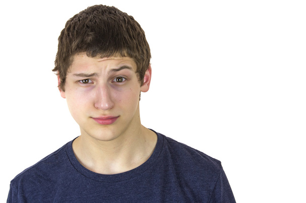 Jeune homme faisant expression faciale stupide
 - Photo, image