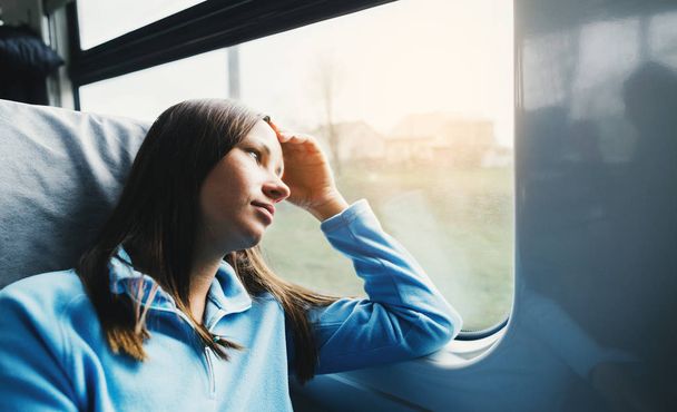 Travel lifestyle Woman traveler riding train - Φωτογραφία, εικόνα