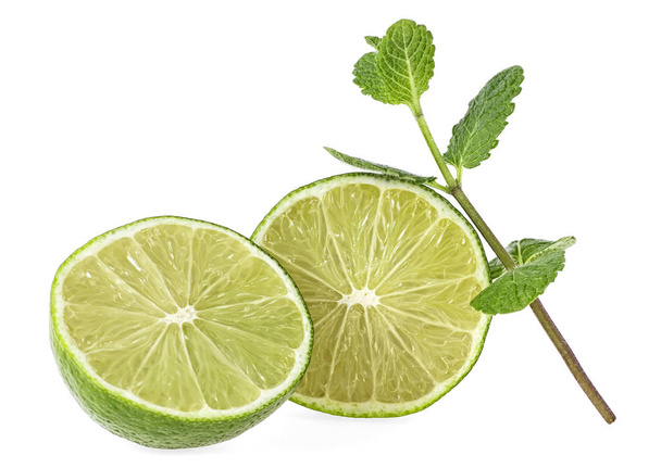Lime fruit and mint leaves isolated on a white background - Foto, imagen