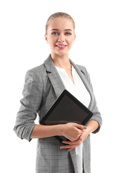 Beautiful female secretary with tablet PC on white background - Photo, image