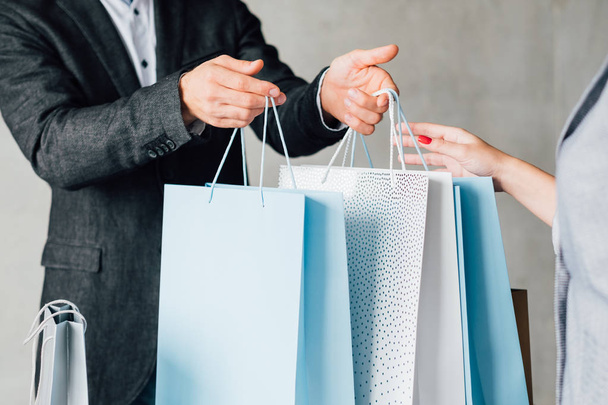 shopping lifestyle black friday couple paper bags - 写真・画像