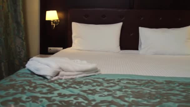 Hotel Room. Scene. Beautiful hotel room with a double bed - Footage, Video