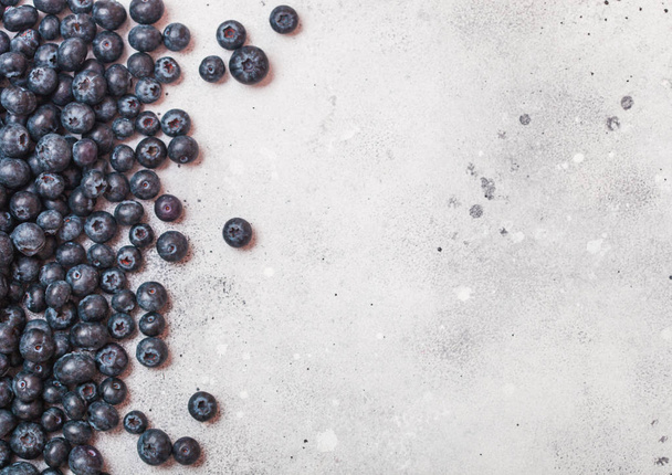 Fresh raw organic blueberries on white background. Food concept. Space for text - Foto, imagen