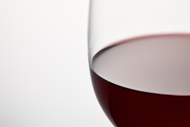 Wine glass of burgundy red wine on white - Fotoğraf, Görsel