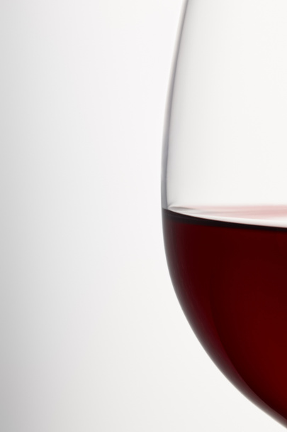 Wine glass of burgundy red wine on white - Foto, immagini
