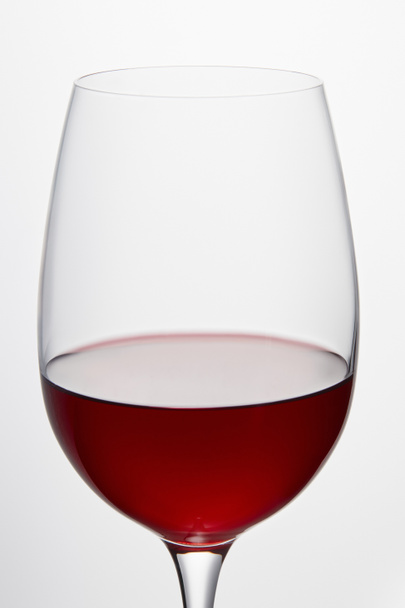 Wine glass with red wine isolated on white - Zdjęcie, obraz