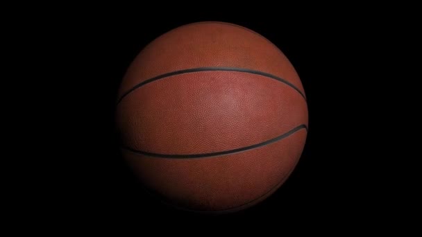 Loopbare roterende basket-bal met alfakanaal. Basketbal bal op zwarte achtergrond - Video