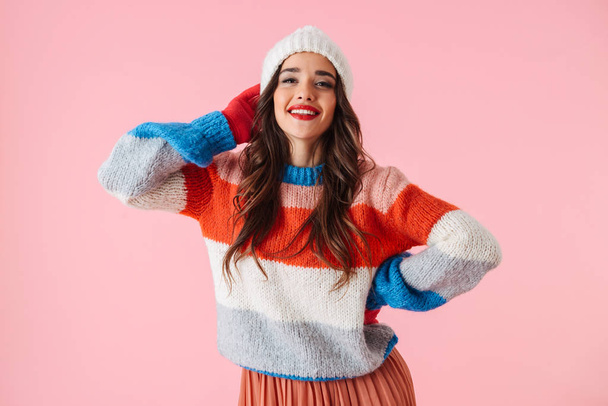 Beautiful young smiling woman wearing sweater - Fotoğraf, Görsel