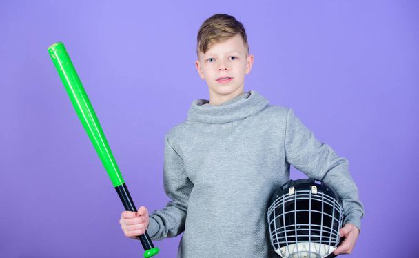 Happy child sportsman. Fitness diet brings health and energy. Gym workout of teen boy sportsman. Baseball bat and helmet. Success. Childhood activity. Sport game. Young promising sportsman - Fotoğraf, Görsel