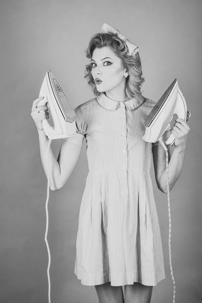 Woman stroking home a clothes iron - Photo, image