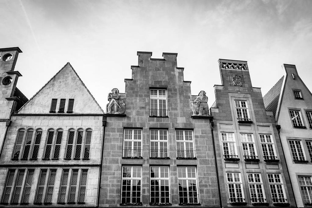Tops of the facades of historic buildings in the center of Mnster, Germany - Photo, Image