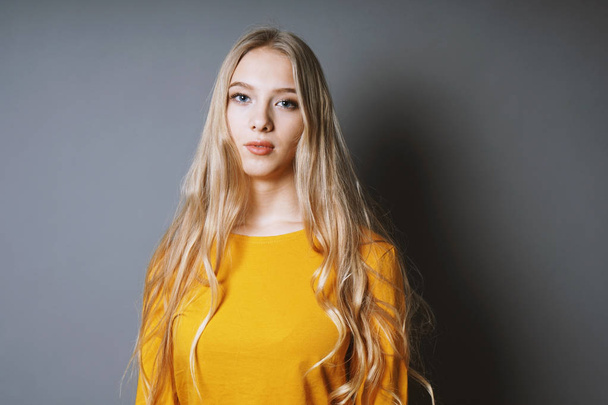 cool young woman with long blond hair - Photo, Image