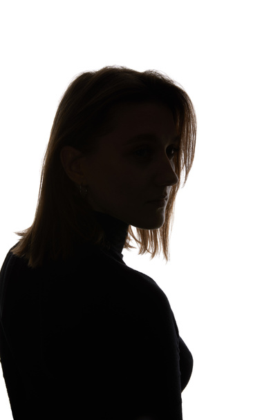 Silhouette of woman looking away isolated on white - Valokuva, kuva