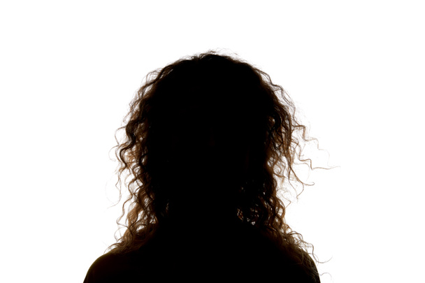 Silueta de mujer con el pelo rizado aislado en blanco
 - Foto, imagen