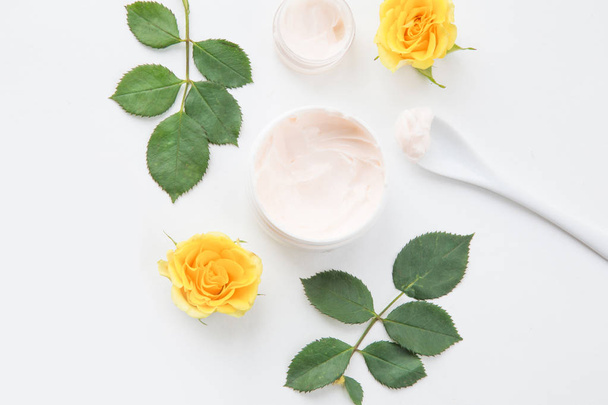 copy top view. Yellow roses face cream. Concept beauty and spa, face and body care - Φωτογραφία, εικόνα
