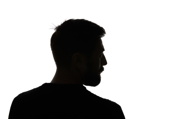 Silhouette of man looking away isolated on white - Fotoğraf, Görsel