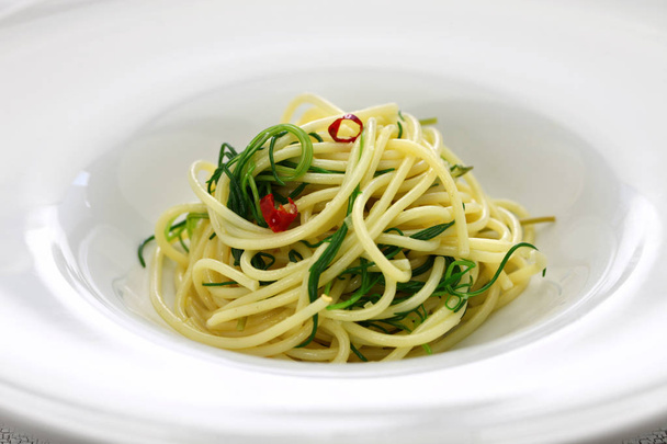 спагетти с agretti, итальянская еда
 - Фото, изображение