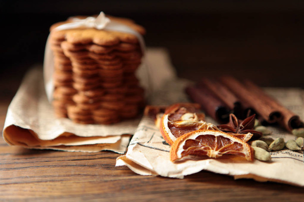 Homemade cookies on dark rustic wooden table, copy space. Healthy vegan wholegrain cookies. - Photo, Image