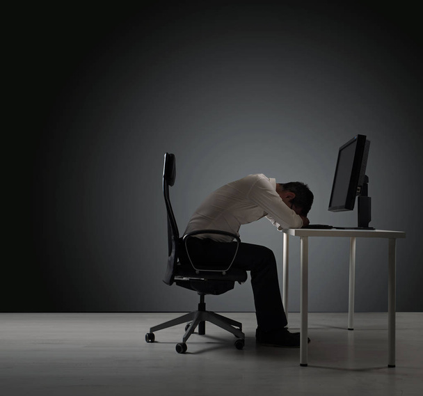 Tired businessman having a nap - isolated - Zdjęcie, obraz