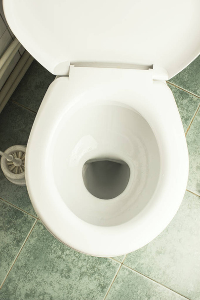 New white ceramic toilet bowl indoors, top view - Foto, Imagen