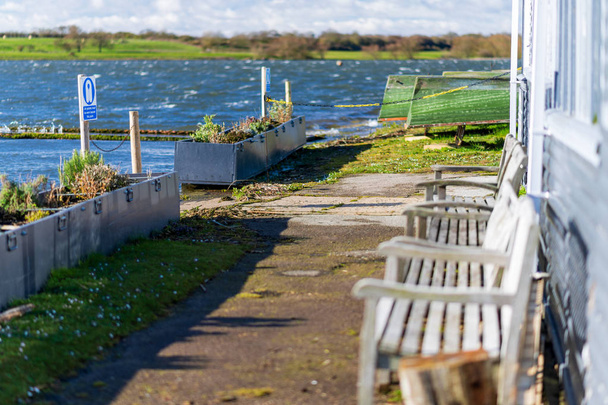 Seating area looking out over Hornsea Mere, East Yorkshire, UK - Photo, Image