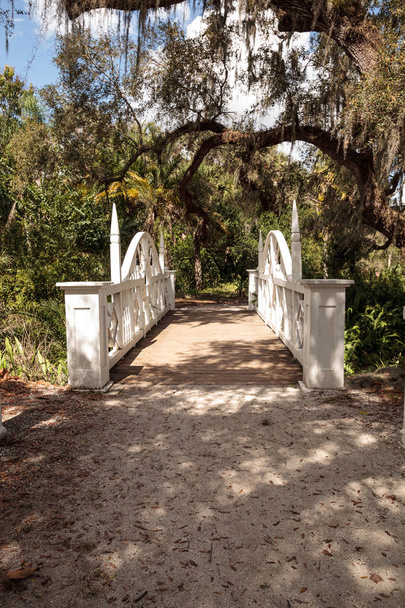 Old wooden bridge along the riverway at historic Koreshan State  - Photo, Image