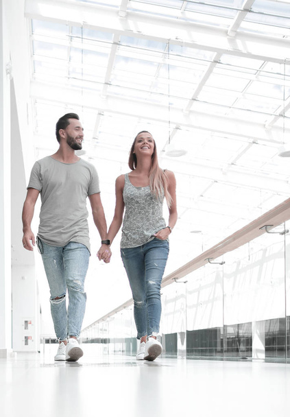 modern couple walking together. - 写真・画像