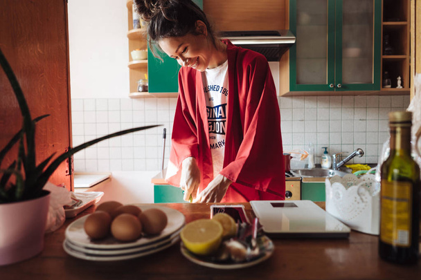 Young Beautiful Woman Wearing Pajamas Preparing Breakfast - Foto, Imagem