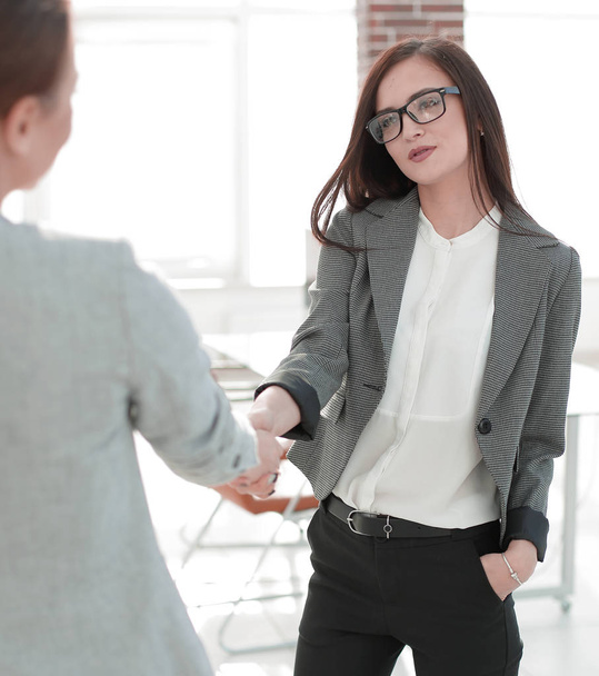 business woman meets the client with a handshake - Photo, Image