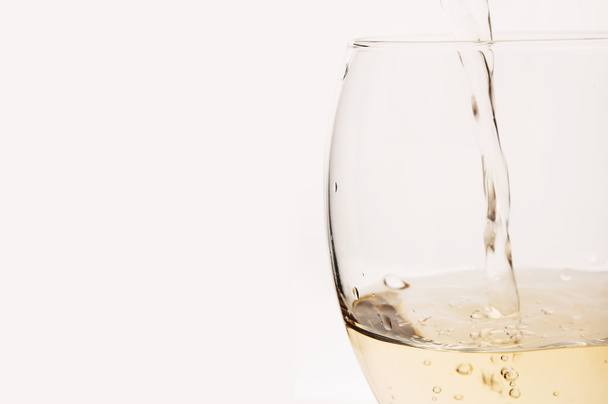 Pouring white wine - Foto, Imagem