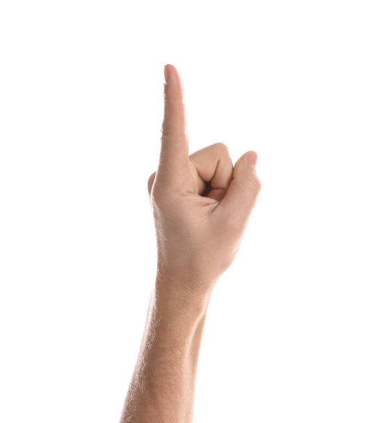 Man pointing at something on white background, closeup of hand - Foto, afbeelding