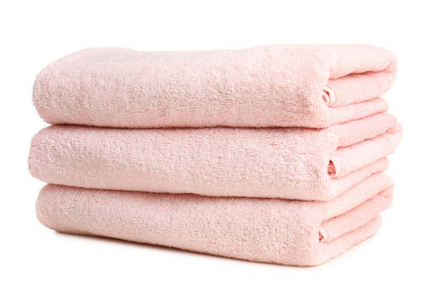 Folded soft terry towels on white background - Foto, imagen