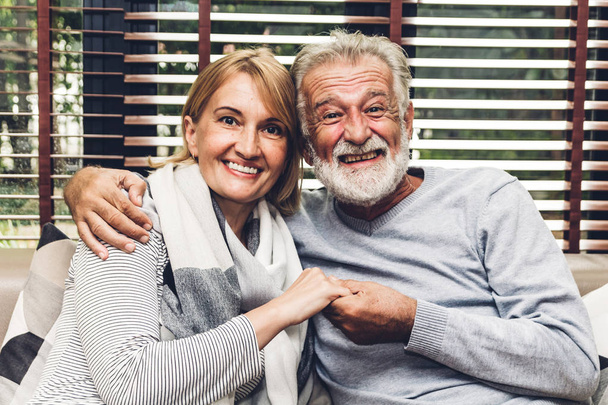 Happy smiling elder senior couple hugging relaxing and talking t - Fotografie, Obrázek