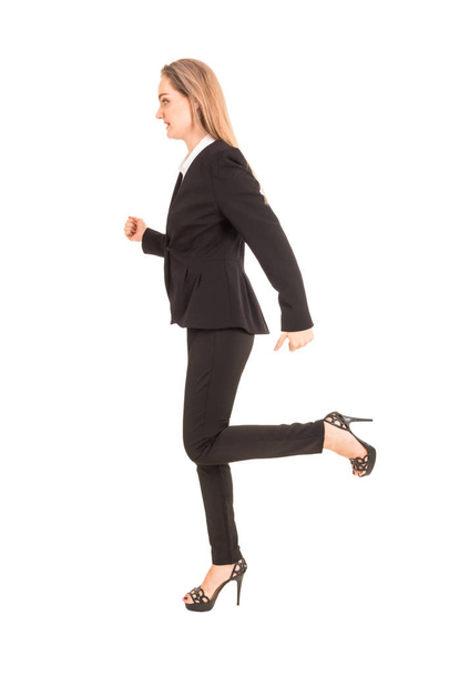 Businesswoman running forward isolated on white background - Photo, Image