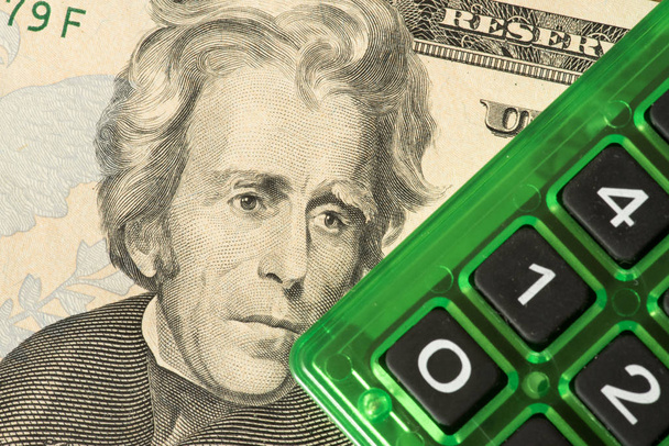 банкнота долара і калькулятор
 - Фото, зображення