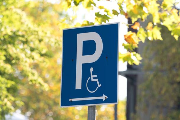 A sign indicating a disabled parking space - Photo, Image