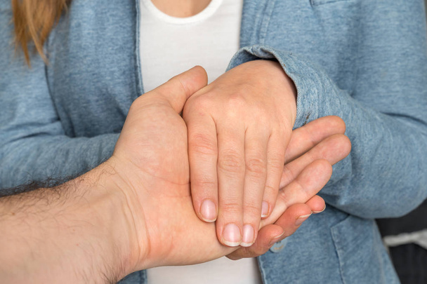 Hands touch each other - together, helping, sympathy concept - Photo, Image
